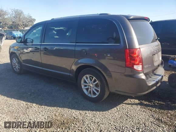 2018 Dodge Grand Caravan SXT z VIN 2C4RDGCGXJR309804, wystawiony jako Copart lot #86464065 z przebiegiem 180 884 mil mil oraz Czysty tytuł • Clean title. Historia ofert i sprzedaży dostępna na DreamBid. Obrazek 2.