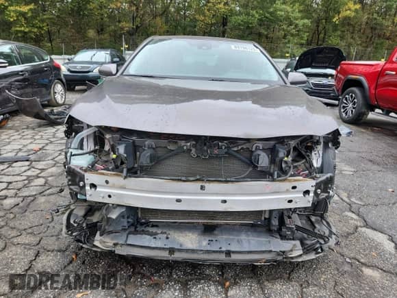 2020 Toyota Camry SE z VIN 4T1M11AKXLU962447, wystawiony jako Copart lot #89796125 z przebiegiem 74 822 mil mil oraz Szkoda całkowita • Salvage title. Historia ofert i sprzedaży dostępna na DreamBid. Obrazek 5.