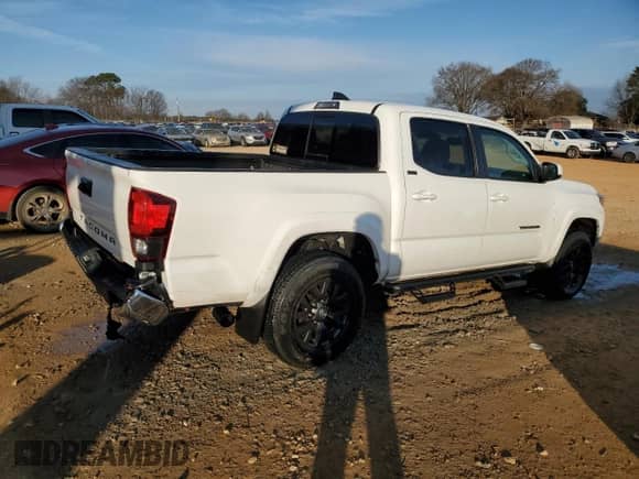 2022 Toyota Tacoma SR5 z VIN 3TMAZ5CNXNM193373, wystawiony jako Copart lot #85957944 z przebiegiem 21 134 mil mil oraz Szkoda całkowita • Salvage title. Historia ofert i sprzedaży dostępna na DreamBid. Obrazek 3.