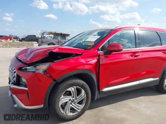 2022 Hyundai Santa Fe SEL with VIN 5NMS2DAJ2NH409867, listed as a IAAI auction lot 43112693 with 72,522 mi miles and . Bid and sale history available at DreamBid. Image 6.
