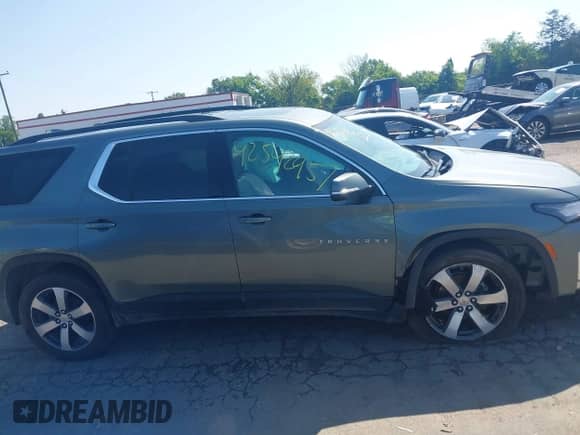 2023 Chevrolet Traverse LT with VIN 1GNEVHKW9PJ230090, listed as a IAAI auction lot 42542957 with 35,640 mi miles and . Bid and sale history available at DreamBid. Image 13.