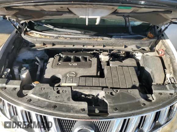 2009 Nissan Murano LE z VIN JN8AZ18W99W157081, wystawiony jako Copart lot #86690095 z przebiegiem 231 835 mil mil oraz Szkoda całkowita • Salvage title. Historia ofert i sprzedaży dostępna na DreamBid. Obrazek 11.