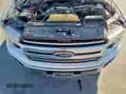 2018 Ford F-150 XLT z VIN 1FTEW1EG2JKE46897, wystawiony jako Copart lot #82422275 z przebiegiem 154 615 mil mil oraz Szkoda całkowita • Salvage title. Historia ofert i sprzedaży dostępna na DreamBid. Obrazek 11.