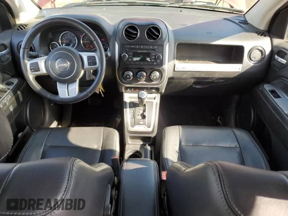 2015 Jeep Compass High Altitude z VIN 1C4NJDEB7FD216708, wystawiony jako Copart lot #71746755 z przebiegiem 116 111 mil mil oraz Czysty tytuł • Clean title. Historia ofert i sprzedaży dostępna na DreamBid. Obrazek 8.