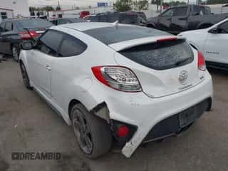 2014 Hyundai Veloster Turbo z VIN KMHTC6AE1EU182501, wystawiony jako IAAI lot #43333749 z przebiegiem 157 957 mil mil oraz . Historia ofert i sprzedaży dostępna na DreamBid. Obrazek 6.