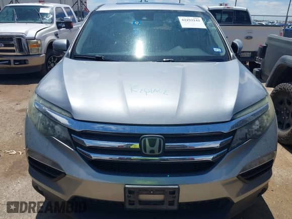 2018 Honda Pilot EX-L with VIN 5FNYF5H61JB008134, listed as a IAAI auction lot 42193142 with 100,254 mi miles and . Bid and sale history available at DreamBid. Image 12.