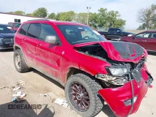 2018 Jeep Grand Cherokee Trailhawk z VIN 1C4RJFLG4JC418934, wystawiony jako IAAI lot #43265600 z przebiegiem Nie podano mil oraz . Historia ofert i sprzedaży dostępna na DreamBid. Obrazek 1.
