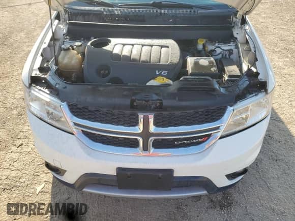 2017 Dodge Journey SXT with VIN 3C4PDDBG2HT575476, listed as a Copart auction lot 68431035 with 94,526 mi miles and Salvage title. Bid and sale history available at DreamBid. Image 11.