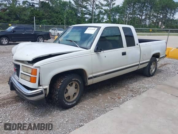 1996 GMC Sierra 1500 with VIN 2GTEC19W6T1541556, listed as a IAAI auction lot 42293418 with 232,983 mi miles and . Bid and sale history available at DreamBid. Image 2.