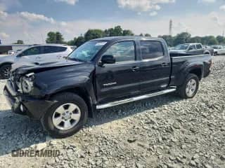 2005 Toyota Tacoma PreRunner with VIN 3TMKU72N05M003970, listed as a Copart auction lot 64075135 with 93,541 mi miles and Salvage title. Bid and sale history available at DreamBid. Image 1.