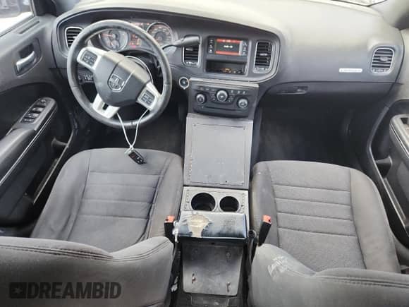 2013 Dodge Charger Police с VIN 2C3CDXAG1DH670569, выставлен на аукционе Copart как лот 84860955 с пробегом 111 155 миль миль и Списание • Salvage title. История ставок и продаж доступна на DreamBid. Изображение 8.