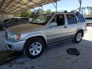 2003 Nissan Pathfinder LE z VIN JN8DR09X33W702732, wystawiony jako Copart lot #76400884 z przebiegiem 259 866 mil mil oraz Szkoda całkowita • Salvage title. Historia ofert i sprzedaży dostępna na DreamBid. Obrazek 1.