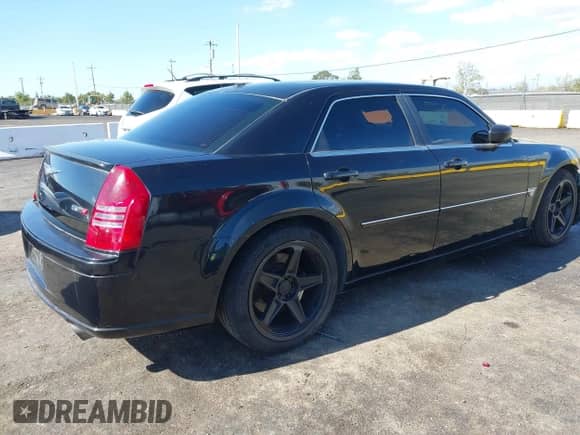 2006 Chrysler 300 C SRT-8 with VIN 2C3LA73W86H388896, listed as a IAAI auction lot 40599030 with 152,547 mi miles and . Bid and sale history available at DreamBid. Image 4.