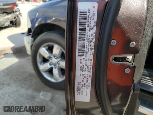 2015 Ram 1500 Big Horn with VIN 1C6RR7TM0FS580228, listed as a Copart auction lot 68446575 with 141,857 mi miles and Salvage title. Bid and sale history available at DreamBid. Image 12.