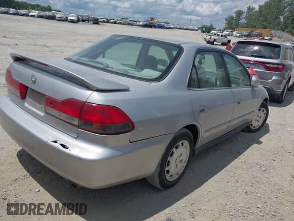 2001 Honda Accord LX with VIN 1HGCG56471A058295, listed as a IAAI auction lot 42751548 with 274,968 mi miles and . Bid and sale history available at DreamBid. Image 4.