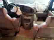 2002 Ford Econoline Cargo Recreational with VIN 1FDRE14W32HB64467, listed as a Copart auction lot 81878595 with 139,517 mi miles and Salvage title. Bid and sale history available at DreamBid. Image 8.