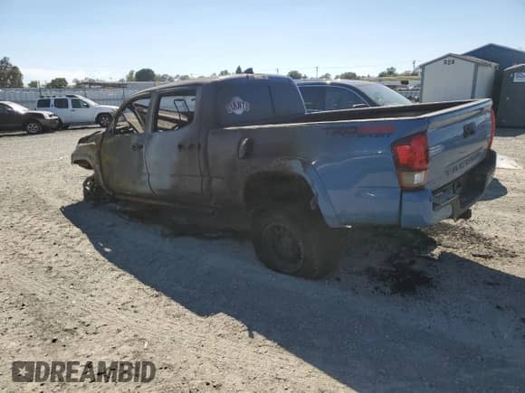 2019 Toyota Tacoma SR5 с VIN 3TMDZ5BN9KM065684, выставлен на аукционе Copart как лот 71884585 с пробегом Не указан миль и На запчасти • Non repairable. История ставок и продаж доступна на DreamBid. Изображение 2.