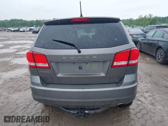 2012 Dodge Journey SE z VIN 3C4PDCAB9CT145811, wystawiony jako IAAI lot #42427991 z przebiegiem 174 416 mil mil oraz . Historia ofert i sprzedaży dostępna na DreamBid. Obrazek 17.