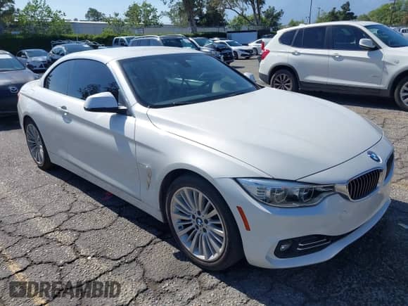 2015 BMW 4 Series 428i with VIN WBA3V7C51FP771904, listed as a IAAI auction lot 42316801 with 93,391 mi miles and . Bid and sale history available at DreamBid. Image 1.