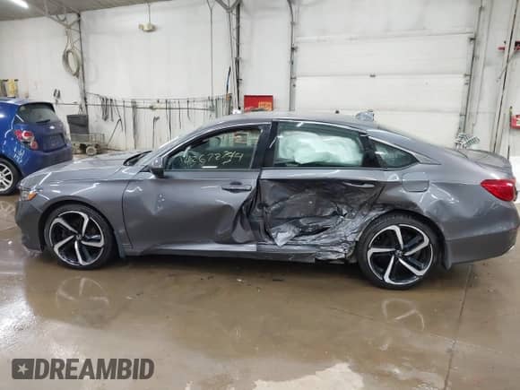 2018 Honda Accord Sport with VIN 1HGCV2E35JA010825, listed as a IAAI auction lot 42672744 with 56,228 mi miles and . Bid and sale history available at DreamBid. Image 14.