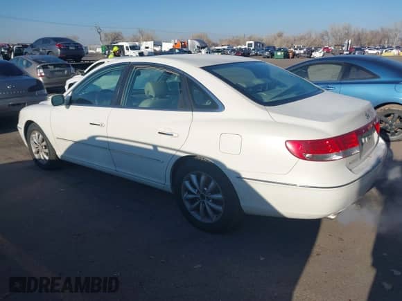 2007 Hyundai Azera SE z VIN KMHFC46F37A177646, wystawiony jako IAAI lot #41347297 z przebiegiem 154 000 mil mil oraz . Historia ofert i sprzedaży dostępna na DreamBid. Obrazek 3.