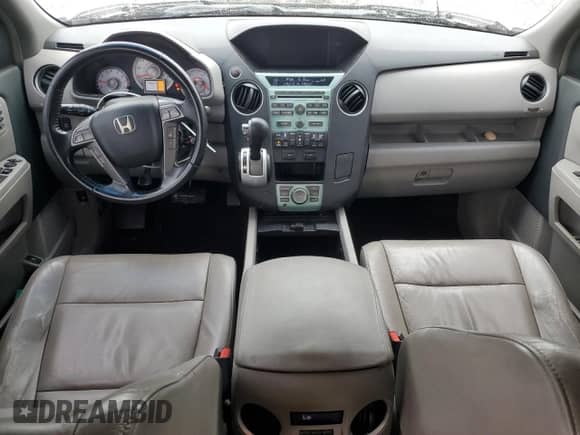 2009 Honda Pilot Touring with VIN 5FNYF38839B027611, listed as a Copart auction lot 67812505 with 148,357 mi miles and Salvage title. Bid and sale history available at DreamBid. Image 8.