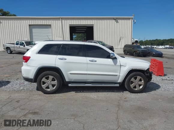 2013 Jeep Grand Cherokee Limited z VIN 1C4RJFBG8DC556272, wystawiony jako IAAI lot #43352592 z przebiegiem 118 793 mil mil oraz . Historia ofert i sprzedaży dostępna na DreamBid. Obrazek 13.