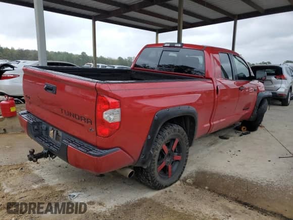 2017 Toyota Tundra SR with VIN 5TFUW5F16HX635935, listed as a Copart auction lot 82652525 with 277,111 mi miles and Salvage title. Bid and sale history available at DreamBid. Image 3.