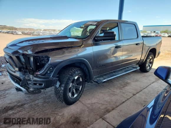 2021 Ram 1500 Rebel z VIN 1C6SRFLT0MN560172, wystawiony jako Copart lot #81118865 z przebiegiem 88 723 mil mil oraz Szkoda całkowita • Salvage title. Historia ofert i sprzedaży dostępna na DreamBid. Obrazek 1.