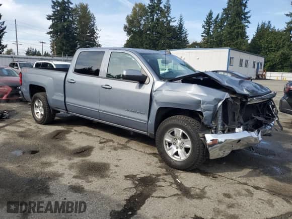 2016 Chevrolet Silverado 1500 LT with VIN 1GCUKREC6GF191336, listed as a Copart auction lot 82389795 with 334,818 mi miles and Salvage title. Bid and sale history available at DreamBid. Image 4.