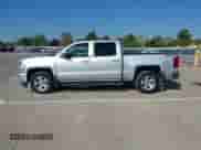 2018 Chevrolet Silverado 1500 LT with VIN 3GCUKREC4JG339988, listed as a IAAI auction lot 43222960 with 162,440 mi miles and . Bid and sale history available at DreamBid. Image 14.