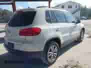 2015 Volkswagen Tiguan S with VIN WVGAV7AXXFW571961, listed as a IAAI auction lot 43537263 with 147,521 mi miles and . Bid and sale history available at DreamBid. Image 4.