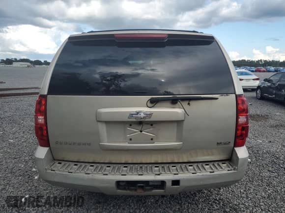 2009 Chevrolet Suburban 2LT with VIN 1GNFC260X9R265285, listed as a Copart auction lot 68830625 with 200,095 mi miles and Salvage title. Bid and sale history available at DreamBid. Image 6.
