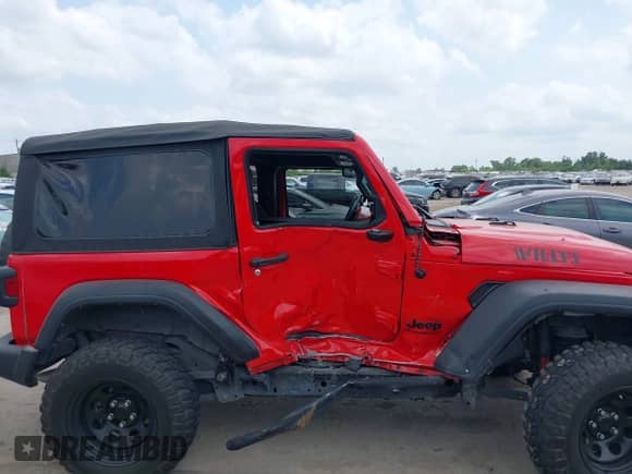 2023 Jeep Wrangler Sport S с VIN 1C4GJXANXPW664733, выставлен на аукционе IAAI как лот 42290672 с пробегом Не указан миль и . История ставок и продаж доступна на DreamBid. Изображение 13.