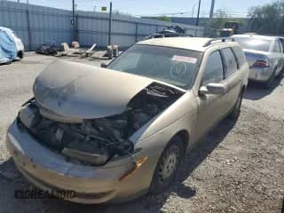 2000 Saturn LW with VIN 1G8JW82R5YY649216, listed as a Copart auction lot 52055385 with Not provided miles and Non repairable. Bid and sale history available at DreamBid. Image 1.