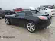2009 Saturn Sky Red Line with VIN 1G8MG35X39Y106052, listed as a Copart auction lot 69893854 with 124,937 mi miles and Salvage title. Bid and sale history available at DreamBid. Image 2.