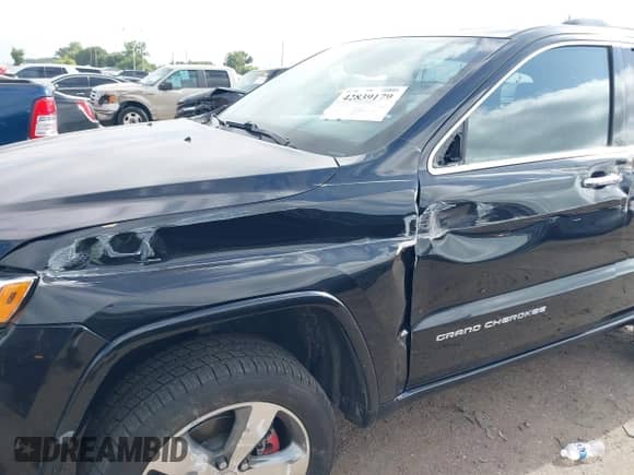 2015 Jeep Grand Cherokee High Altitude z VIN 1C4RJFCT1FC740242, wystawiony jako IAAI lot #42839179 z przebiegiem 121 830 mil mil oraz . Historia ofert i sprzedaży dostępna na DreamBid. Obrazek 6.