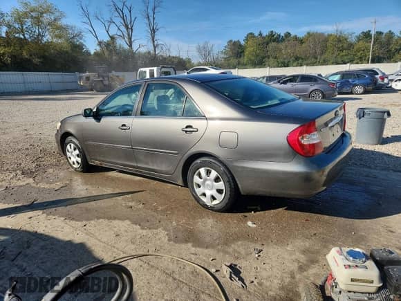 2002 Toyota Camry LE with VIN JTDBE32K220023762, listed as a Copart auction lot 85343375 with 242,626 mi miles and Non repairable. Bid and sale history available at DreamBid. Image 2.