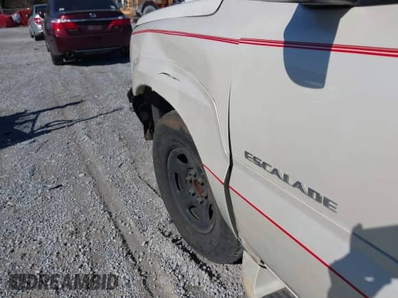 2004 Cadillac Escalade with VIN 1GYEC63TX4R299594, listed as a IAAI auction lot 41833184 with 320,822 mi miles and . Bid and sale history available at DreamBid. Image 11.