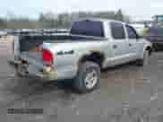 2004 Dodge Dakota Sport z VIN 1D7HG38K54S634958, wystawiony jako IAAI lot #41831018 z przebiegiem 135 917 mil mil oraz . Historia ofert i sprzedaży dostępna na DreamBid. Obrazek 4.