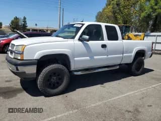 2005 Chevrolet Silverado 1500 LS with VIN 1GCEK19B85E327539, listed as a Copart auction lot 71868145 with 238,597 mi miles and Clean title. Bid and sale history available at DreamBid. Image 1.