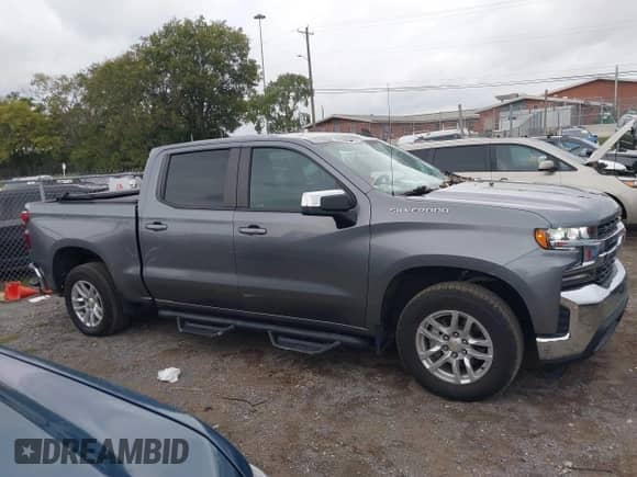2021 Chevrolet Silverado 1500 LT with VIN 1GCPWCEDXMZ149169, listed as a IAAI auction lot 43350821 with 83,296 mi miles and . Bid and sale history available at DreamBid. Image 13.