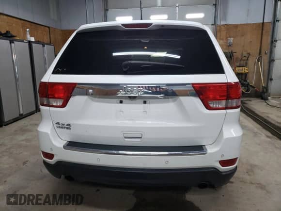 2013 Jeep Grand Cherokee Limited с VIN 1C4RJFBT1DC573606, выставлен на аукционе Copart как лот 57759295 с пробегом 145 194 миль миль и Списание • Salvage title. История ставок и продаж доступна на DreamBid. Изображение 6.