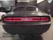 2013 Dodge Challenger SXT с VIN 2C3CDYAG5DH593050, выставлен на аукционе IAAI как лот 43392807 с пробегом 163 707 миль миль и . История ставок и продаж доступна на DreamBid. Изображение 16.