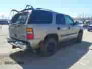 2003 Chevrolet Tahoe LT z VIN 1GNEK13Z83J107450, wystawiony jako IAAI lot #42006801 z przebiegiem 310 767 mil mil oraz . Historia ofert i sprzedaży dostępna na DreamBid. Obrazek 4.