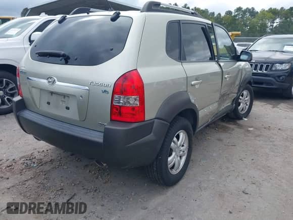 2006 Hyundai Tucson GLS with VIN KM8JN72D86U257564, listed as a IAAI auction lot 43199464 with 99,221 mi miles and . Bid and sale history available at DreamBid. Image 4.