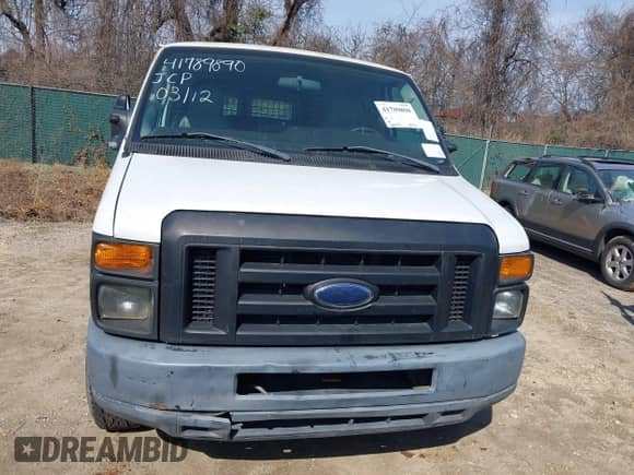 2009 Ford Econoline Cargo Commercial with VIN 1FTSE34P59DA00617, listed as a IAAI auction lot 41789890 with 26,444 mi miles and . Bid and sale history available at DreamBid. Image 6.