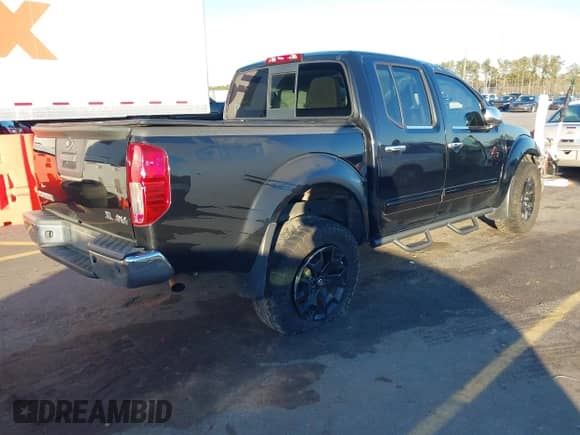 2019 Nissan Frontier SV with VIN 1N6AD0EV8KN758331, listed as a IAAI auction lot 41265276 with 129,165 mi miles and . Bid and sale history available at DreamBid. Image 4.