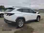 2022 Hyundai Tucson SEL with VIN 5NMJBCAE9NH127363, listed as a Copart auction lot 84041315 with 143,255 mi miles and Salvage title. Bid and sale history available at DreamBid. Image 3.