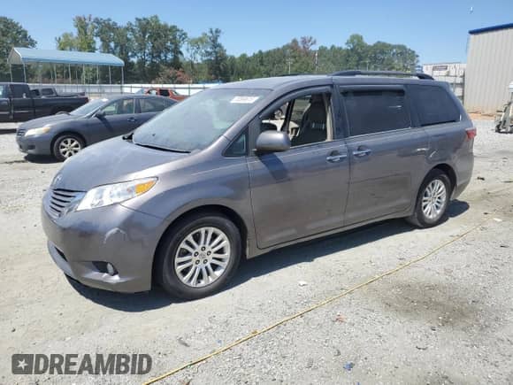 2015 Toyota Sienna XLE with VIN 5TDYK3DC9FS642659, listed as a Copart auction lot 70899615 with 147,363 mi miles and Salvage title. Bid and sale history available at DreamBid. Image 1.